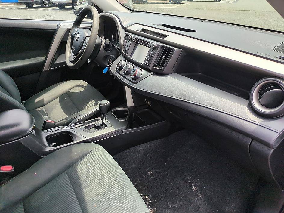 Used 2016 Black Currant Metallic Toyota LE image 32