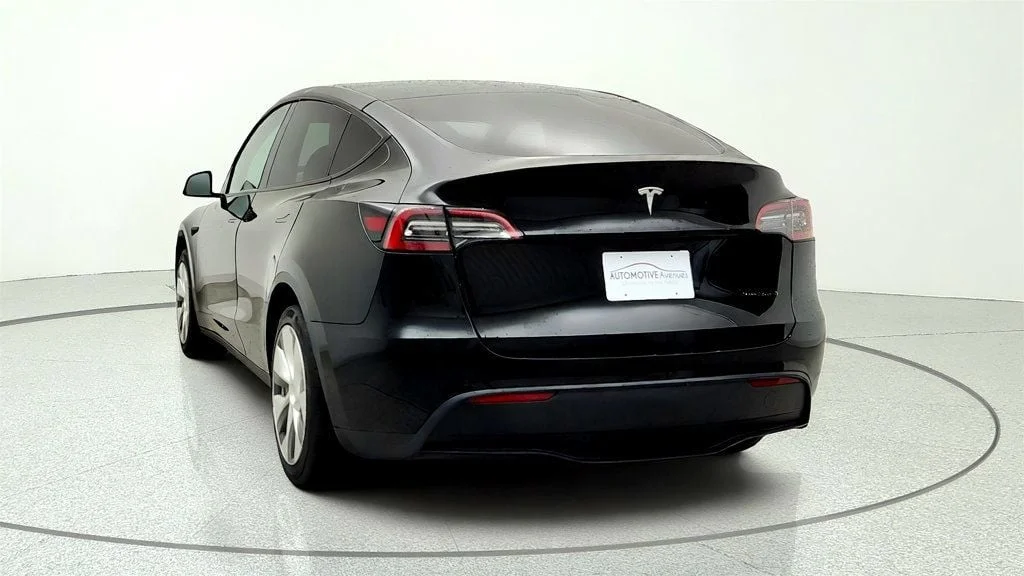 Used 2021 Solid Black Tesla Long Range AWD w/ White/Black 7-Seat Interior image 6