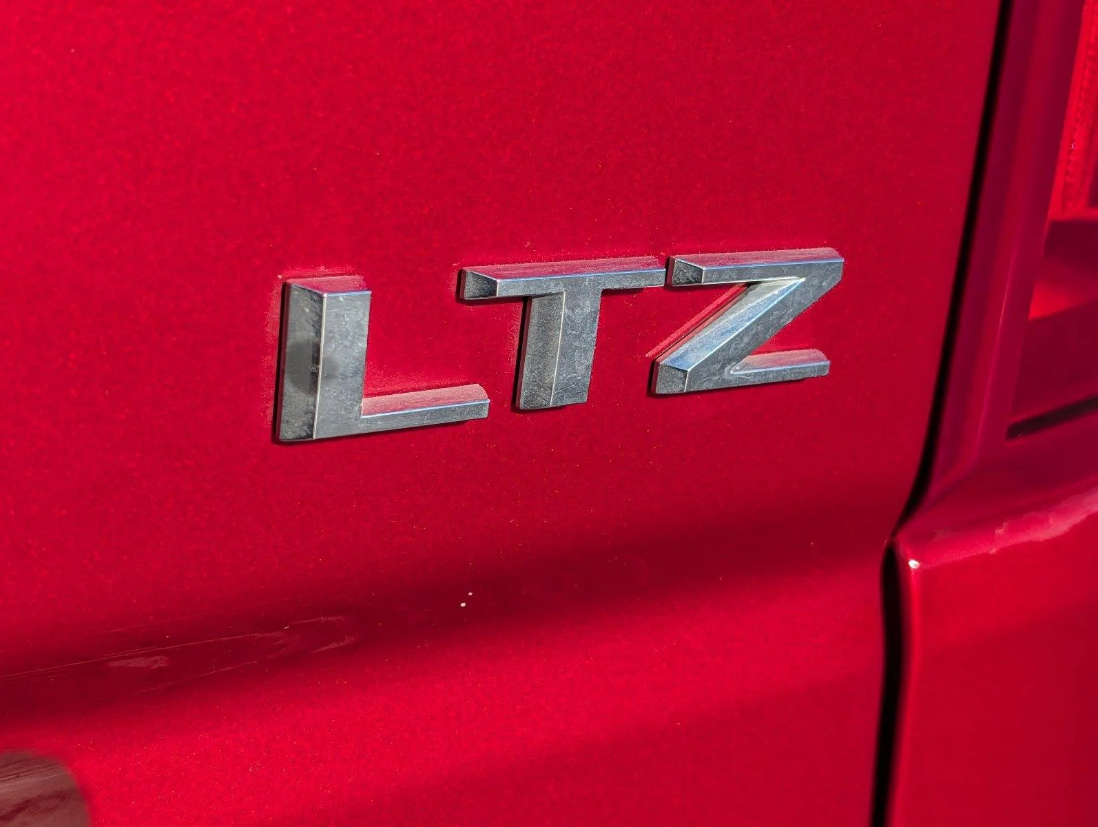 Used 2024 Radiant Red Tintcoat Chevrolet LTZ image 38