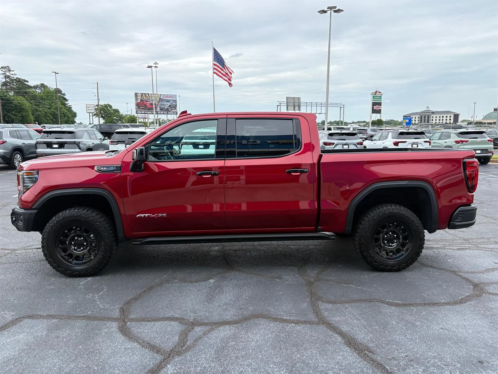 Used 2026 Volcanic Red Tintcoat GMC AT4X image 16