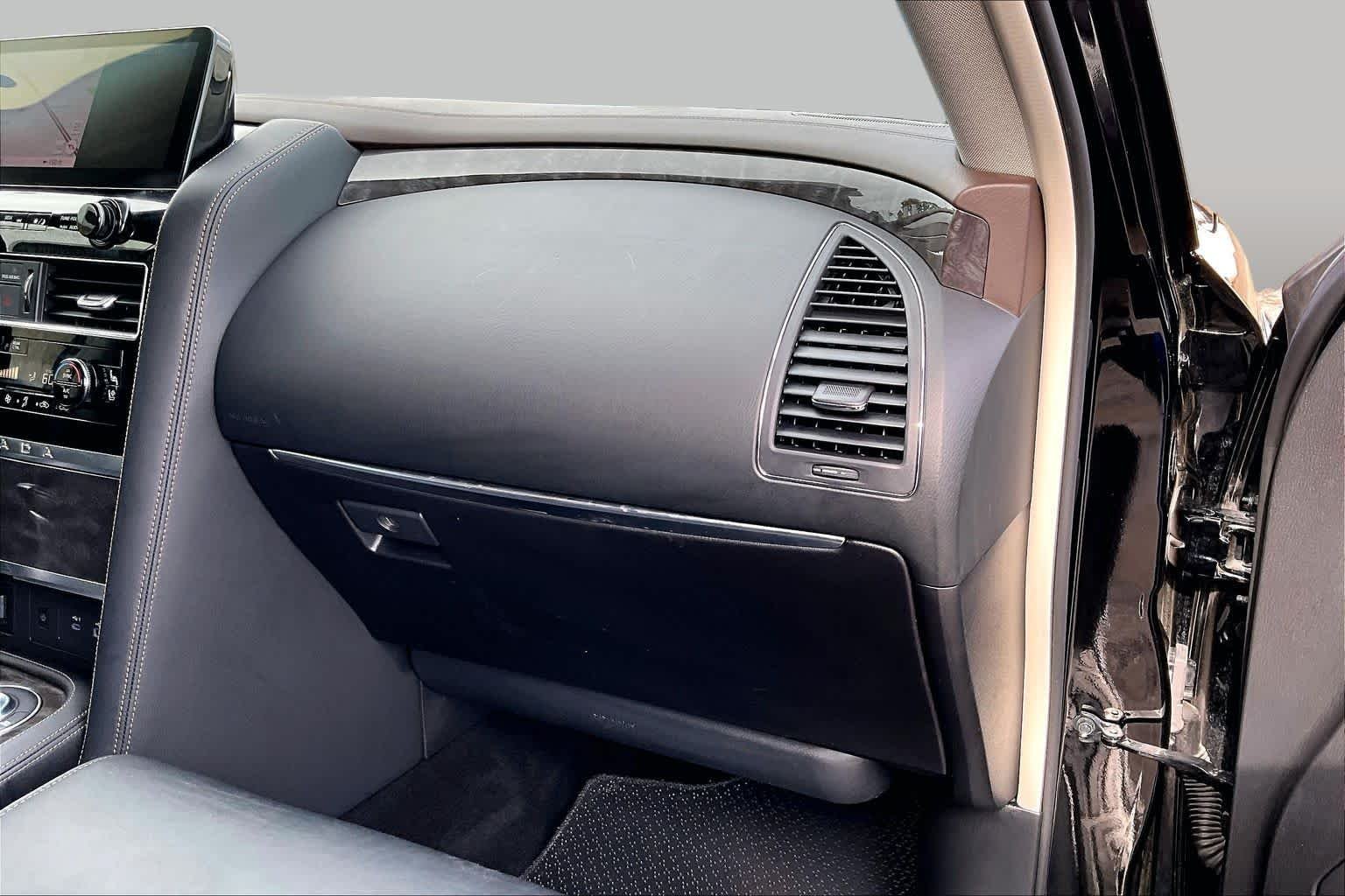 Used 2023 Super Black Nissan Platinum image 21