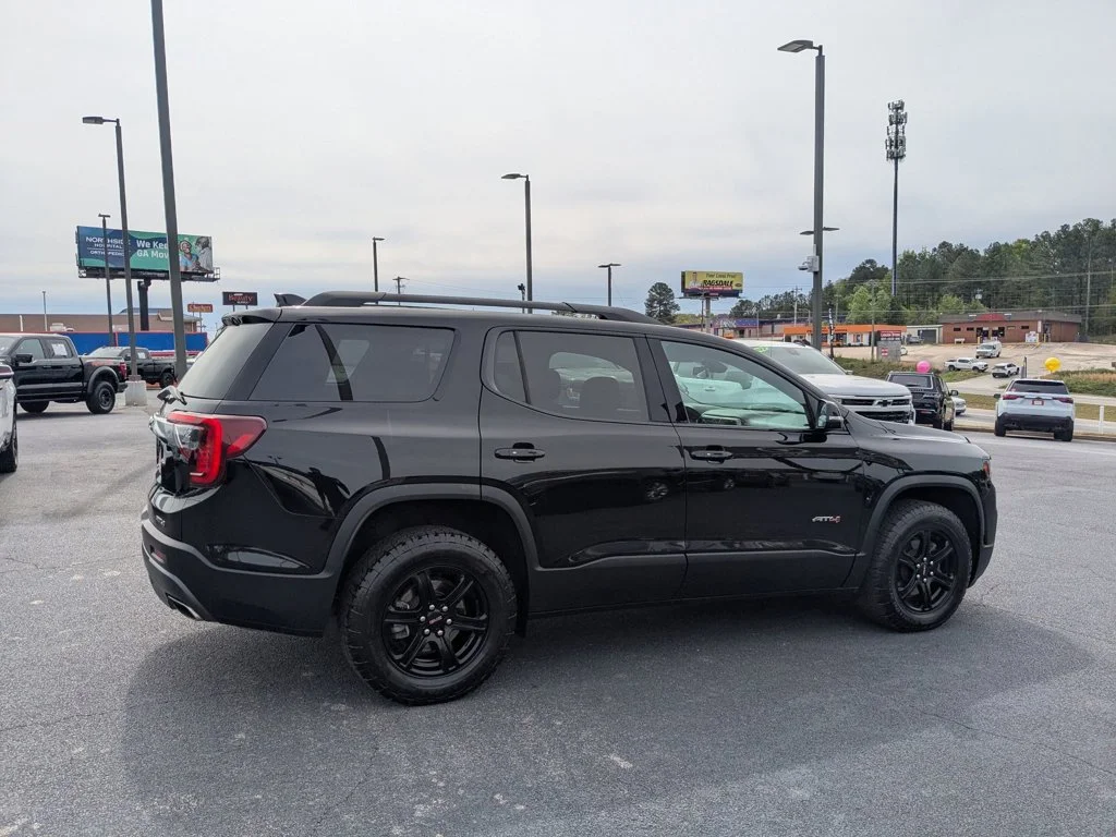 Used 2023 Ebony Twilight Metallic GMC AT4 image 4