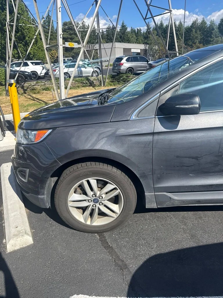 Used 2018 Magnetic Metallic Ford SEL image 3