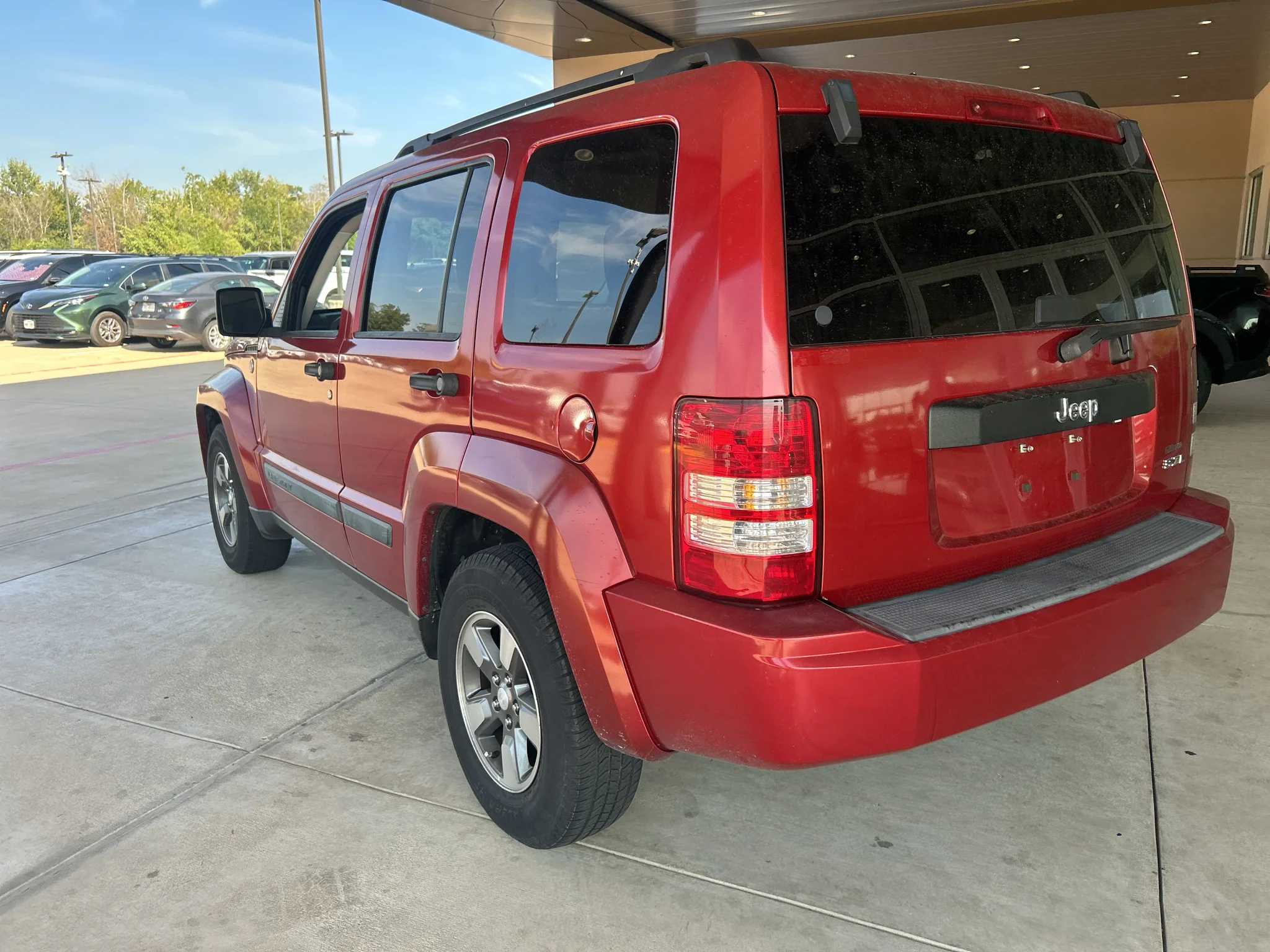 Used 2008 Inferno Red Crystal Pearlcoat Jeep Sport image 6