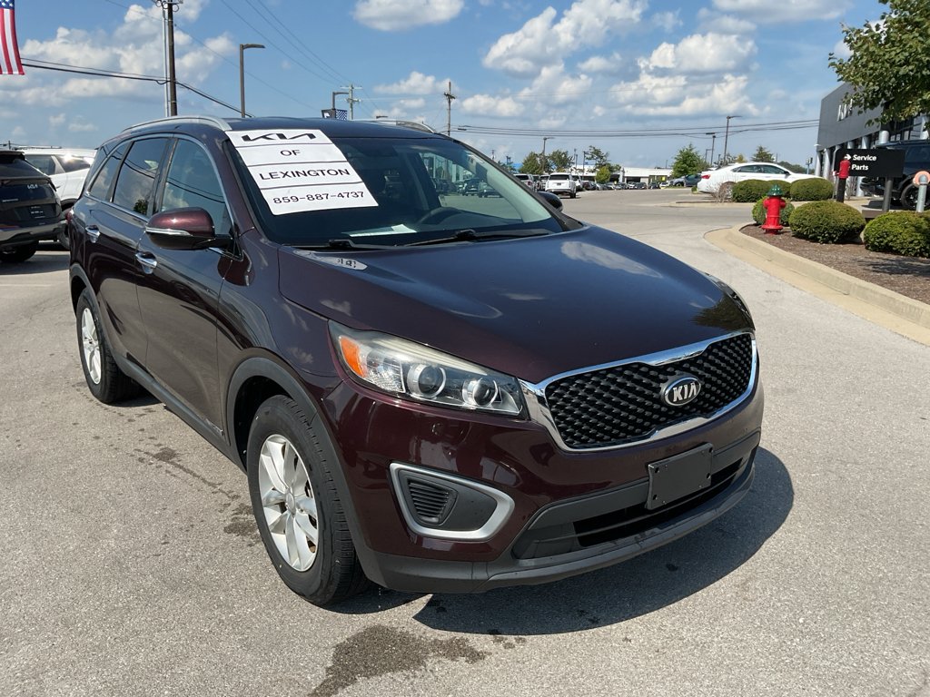 Used 2016 Dark Cherry Kia LX image 2