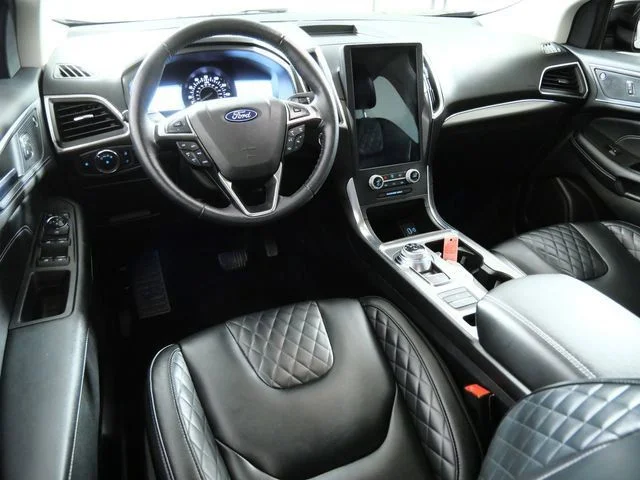 Used 2023 Black Ford Titanium image 4