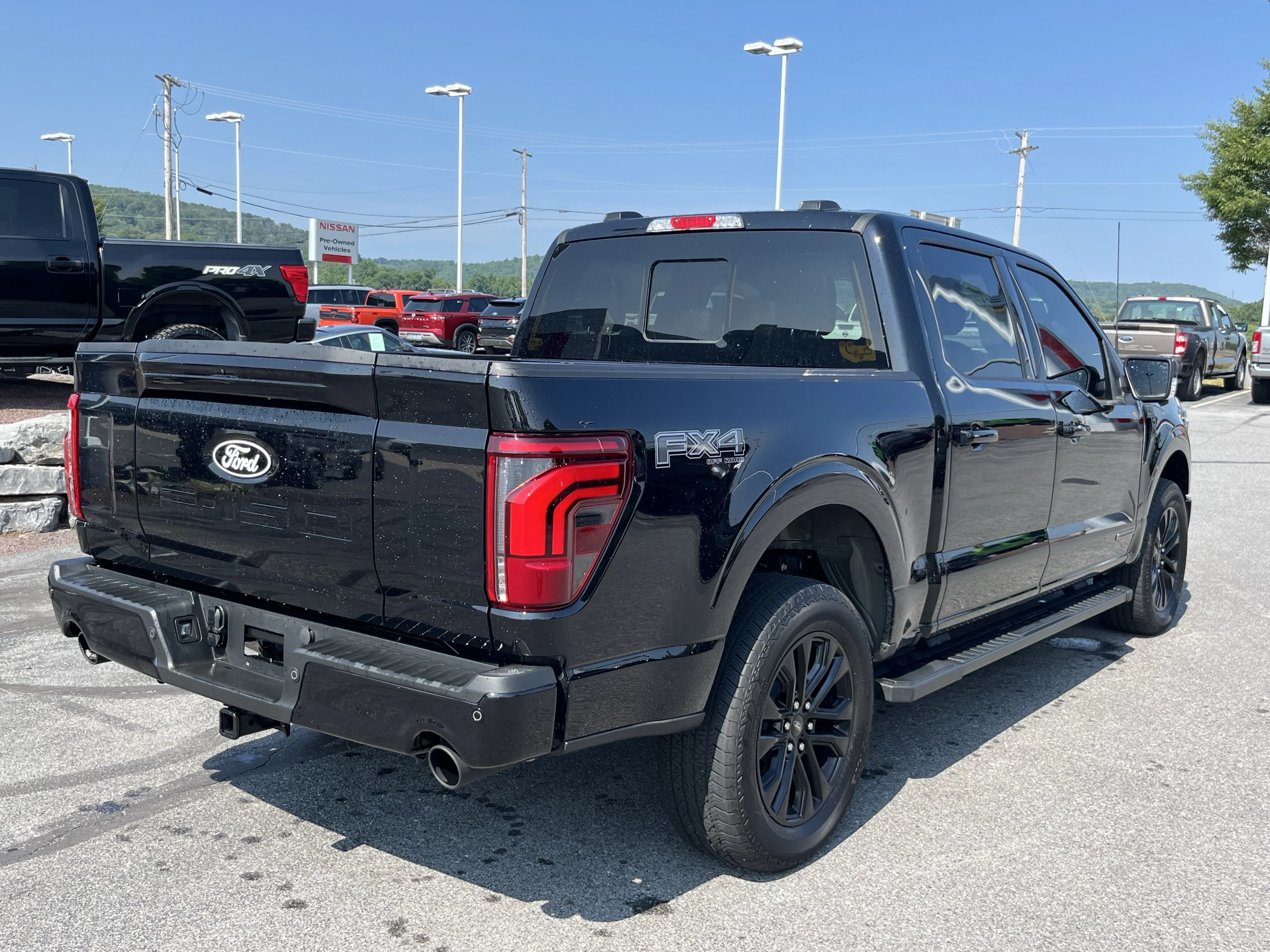 Used 2025 Black Metallic Ford Lariat image 5