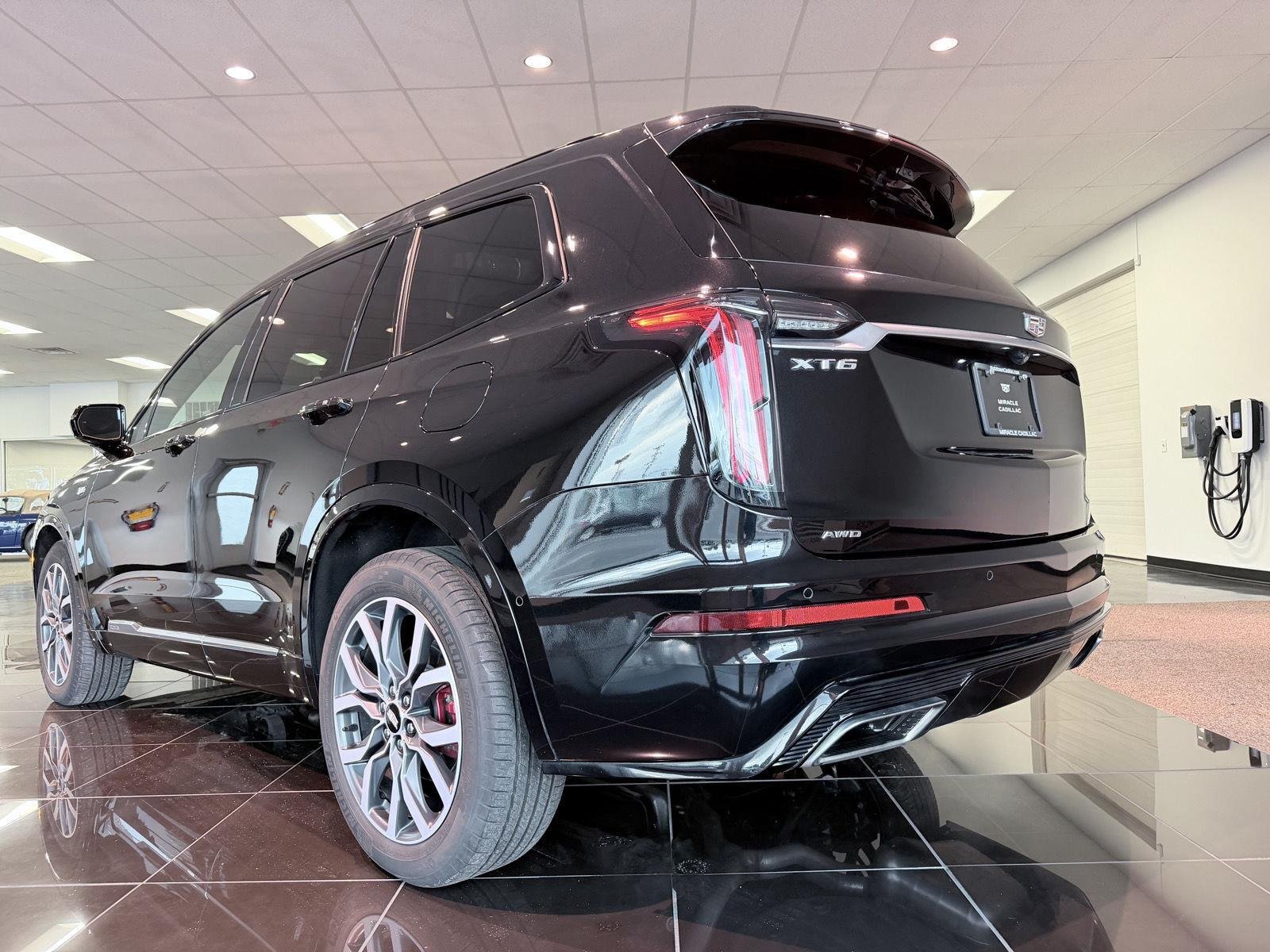 Used 2024 Stellar Black Metallic Cadillac Sport image 6