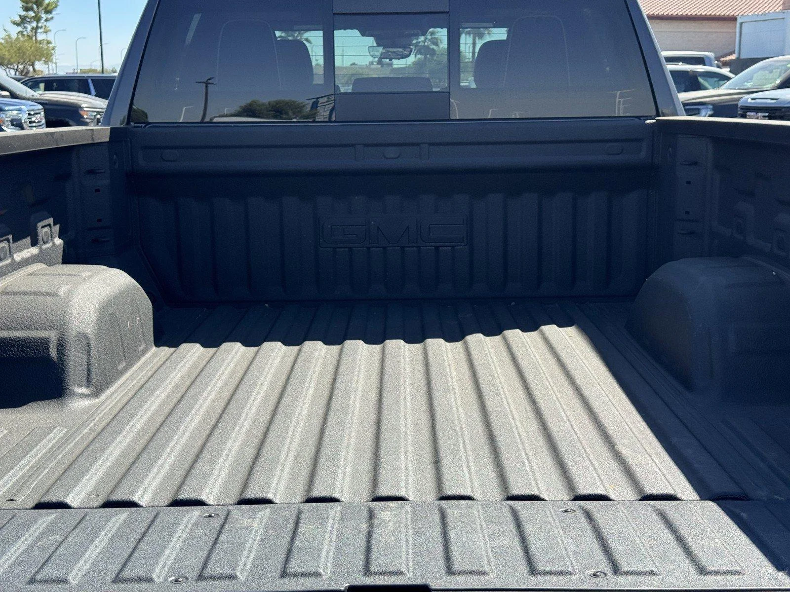 New 2026 TITANIUM RUSH METALLIC GMC AT4X image 11