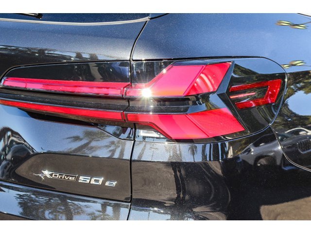 New 2026 Black Sapphire Metallic BMW xDrive50e image 5