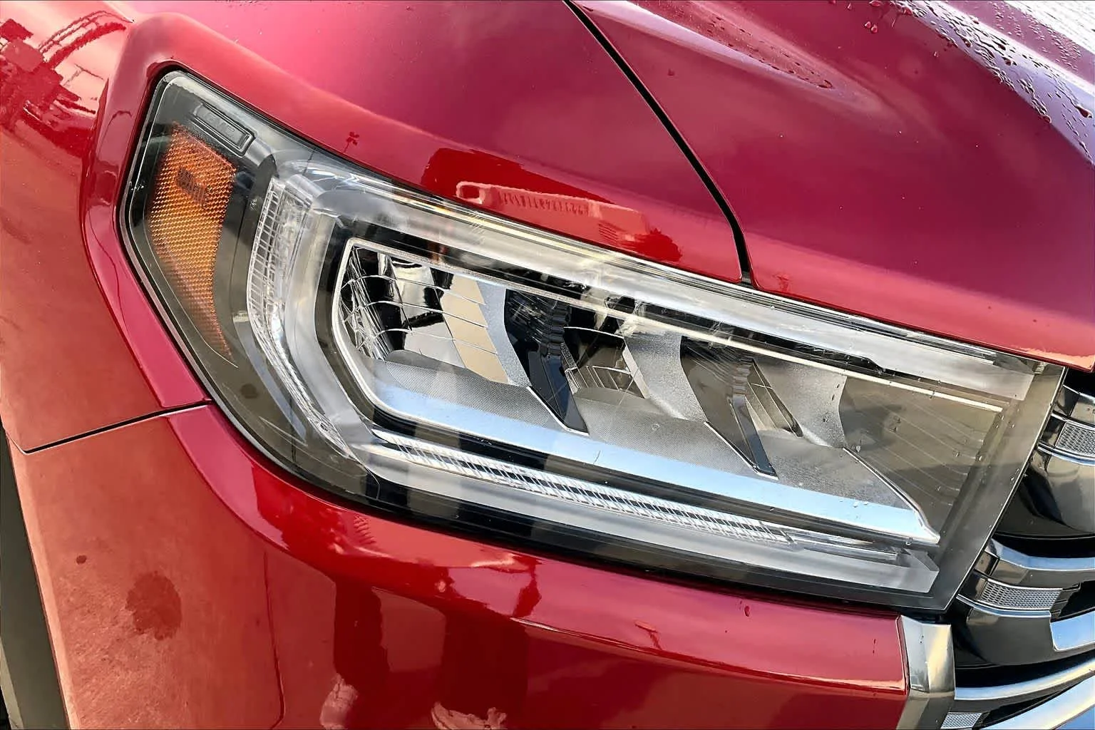 Used 2023 VOLCANIC RED TINCOAT GMC AT4 image 54