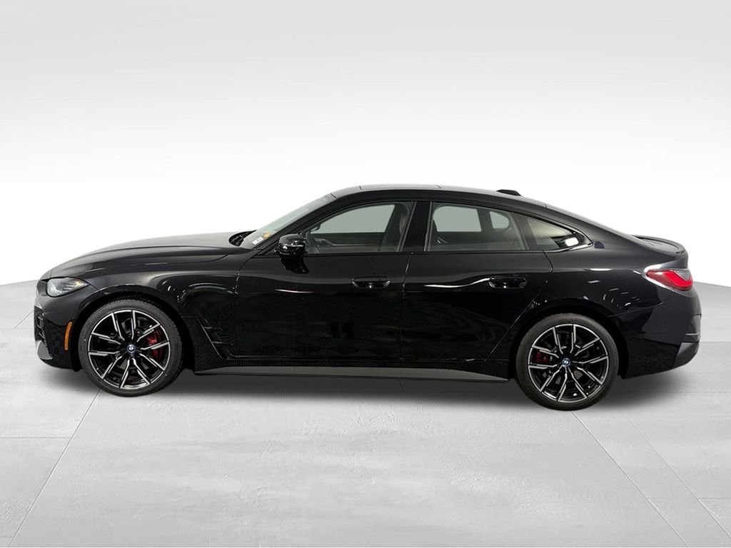 Used 2023 Black Sapphire Metallic BMW eDrive40 image 9