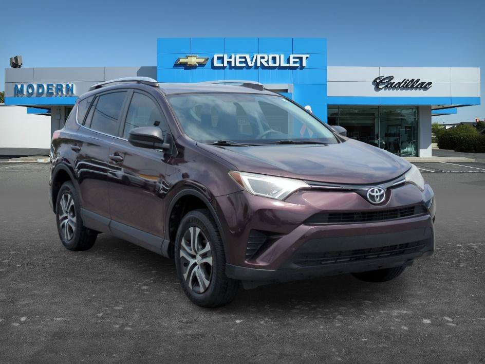 Used 2016 Black Currant Metallic Toyota LE image 7