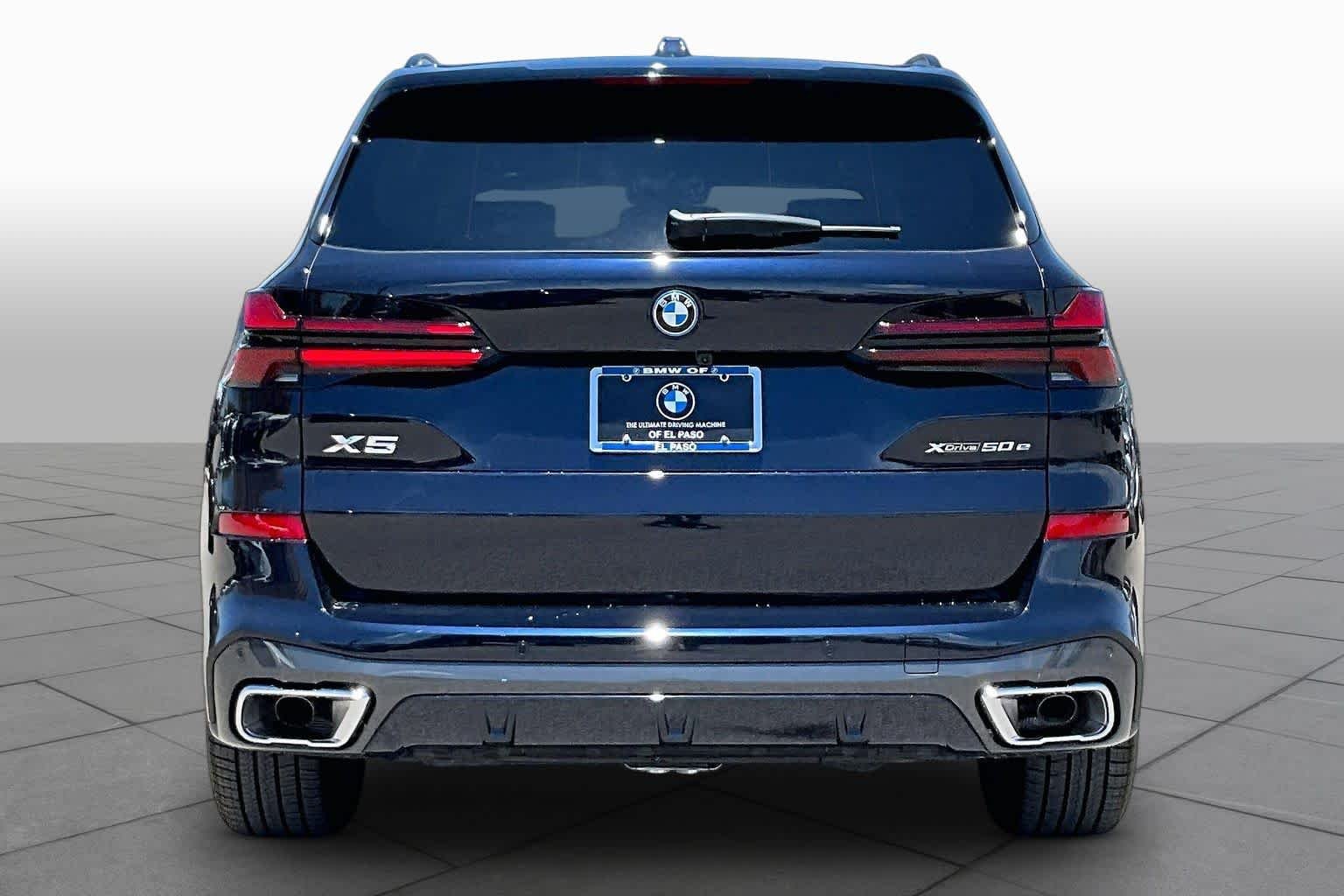 New 2026 Carbon Black Metallic BMW xDrive50e image 4