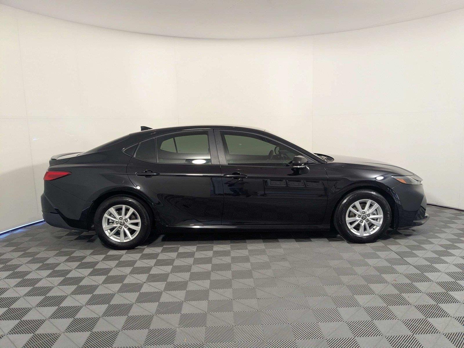 Used 2025 Midnight Black Metallic Toyota LE image 4