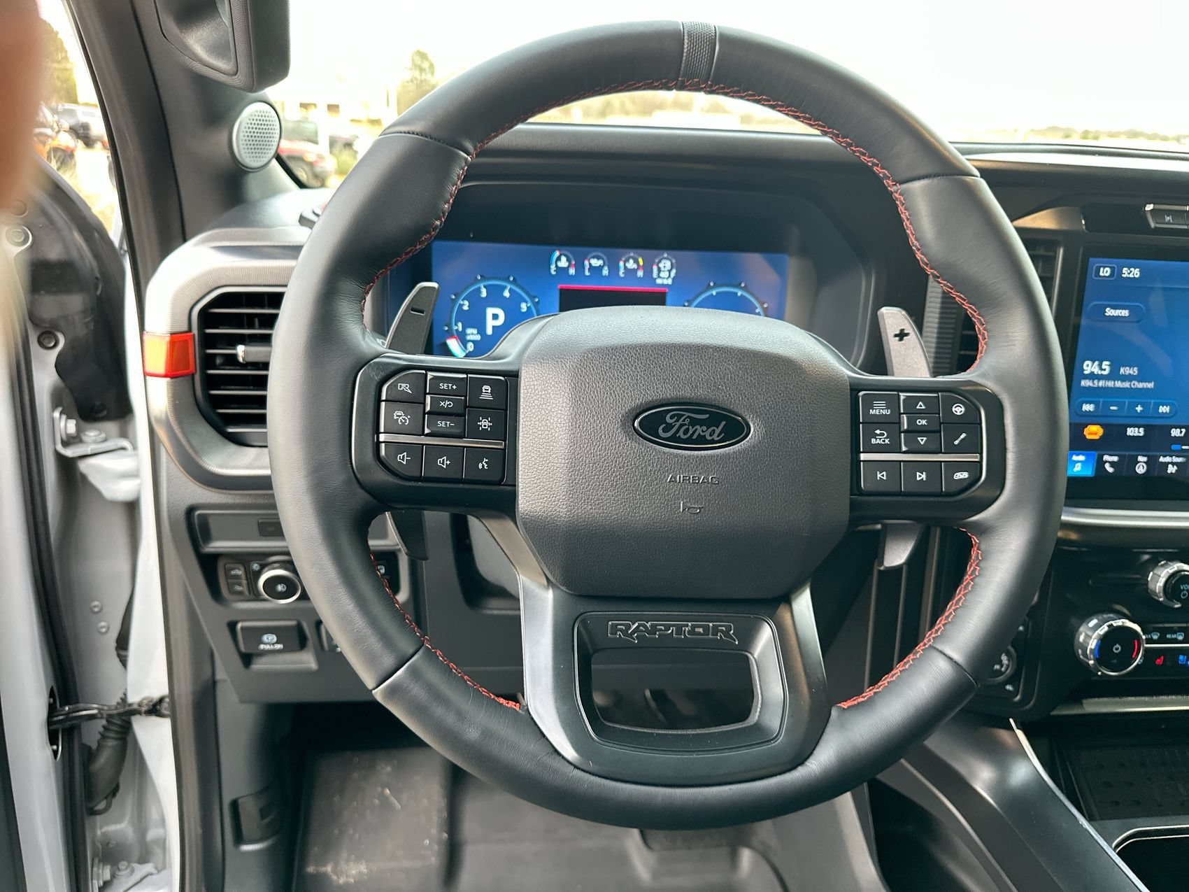 Used 2025 White Metallic Ford Raptor image 14