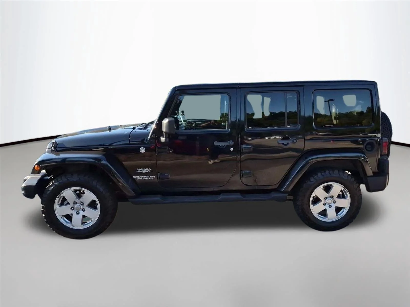 Used 2011 Black Clear Coat Jeep Sahara image 2