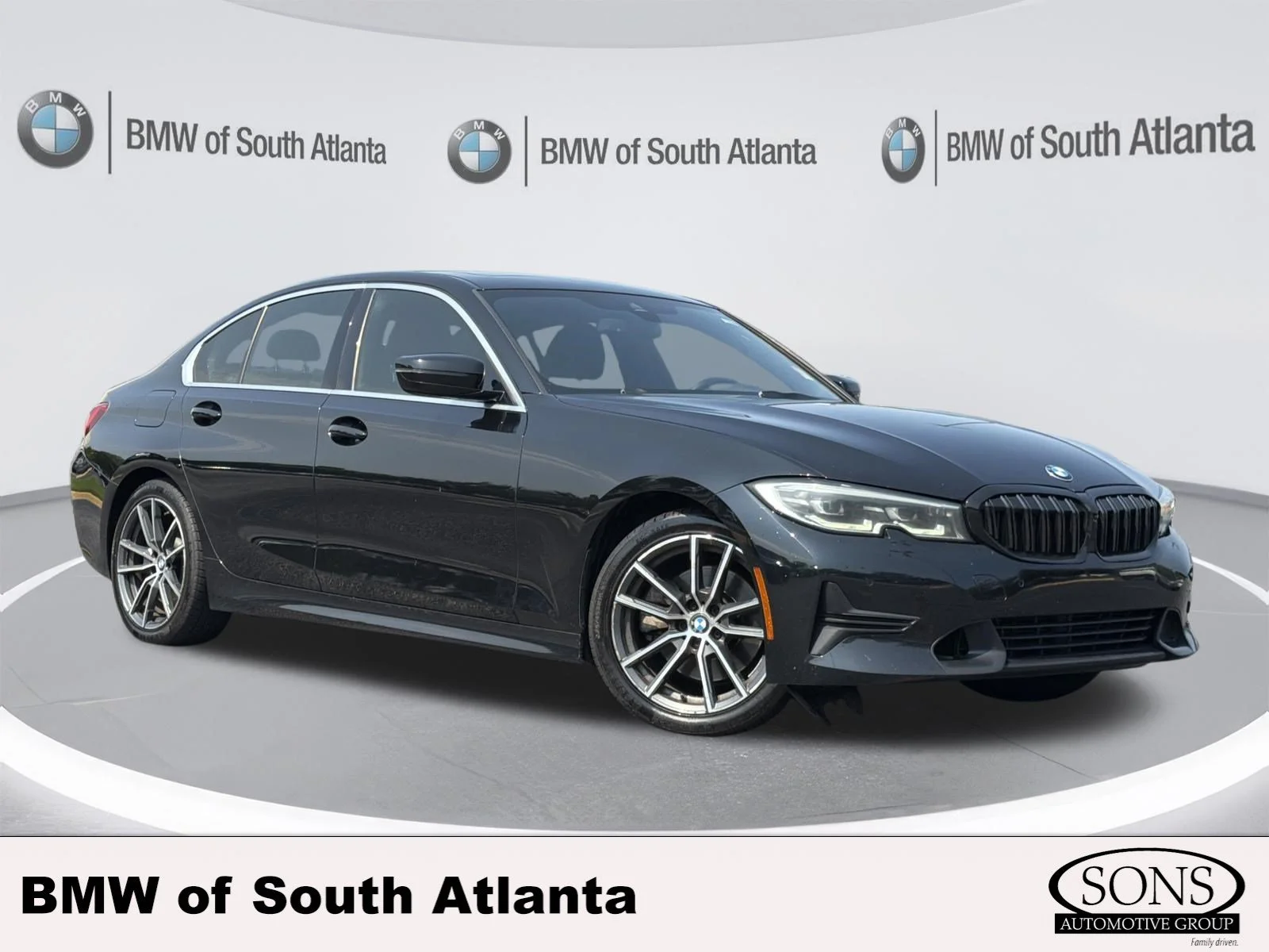 Used 2021 Black Sapphire Metallic BMW 330i image 1