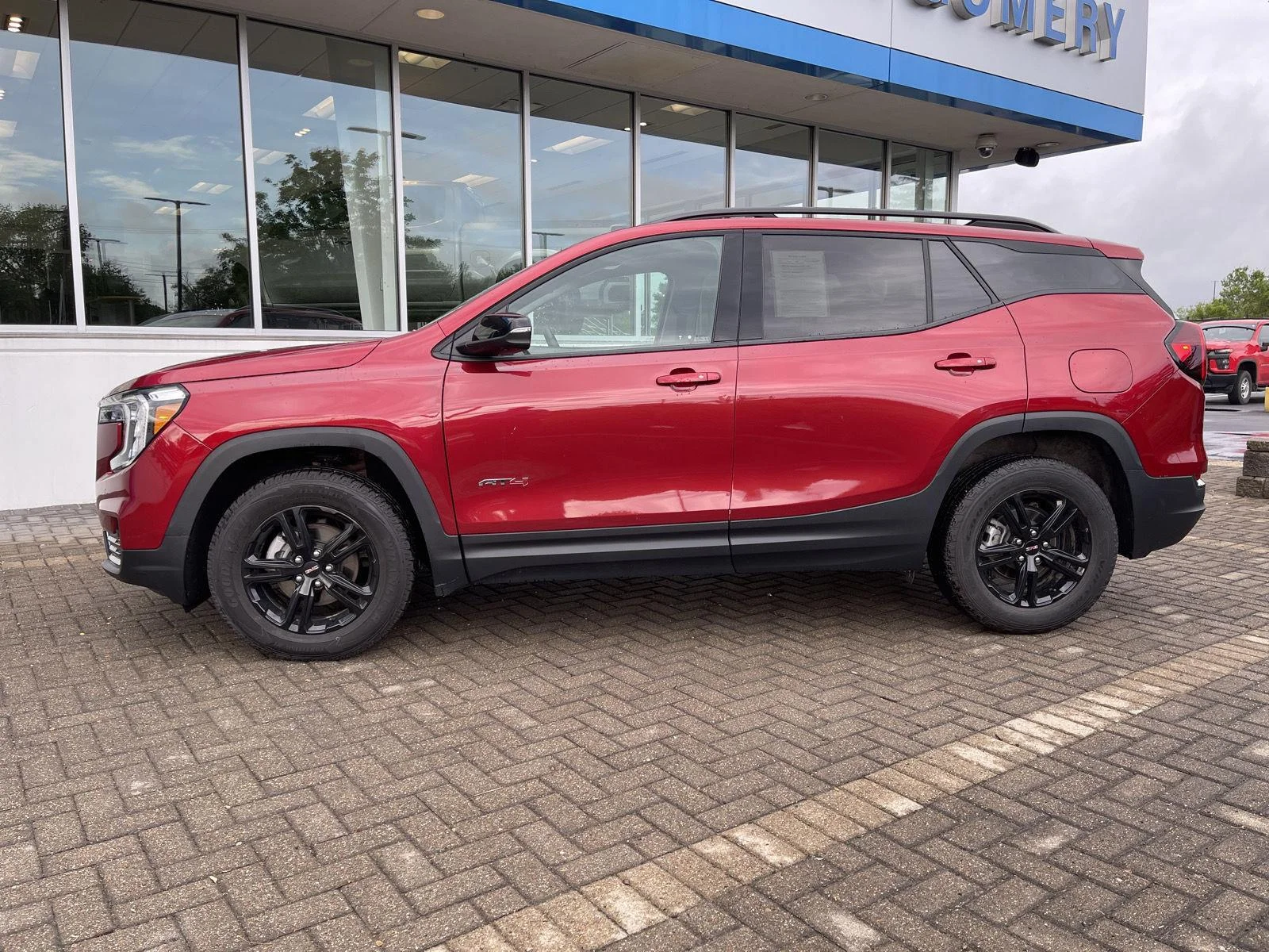 Used 2024 Volcanic Red Tintcoat GMC AT4 image 2