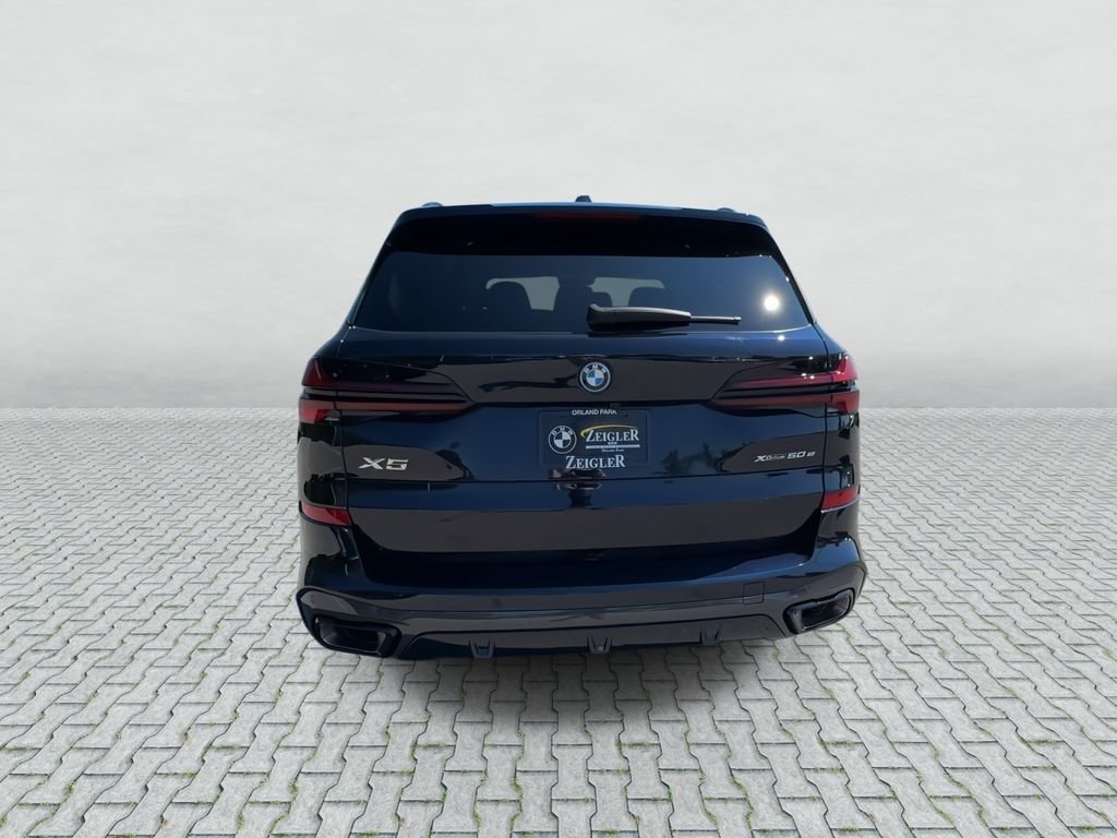 New 2026 Carbon Black Metallic BMW xDrive50e image 7