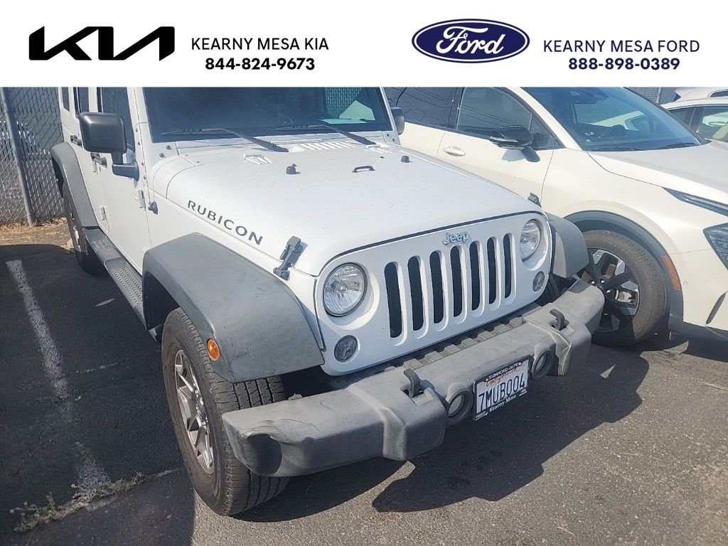Used 2015 White Jeep Unlimited Rubicon image 1