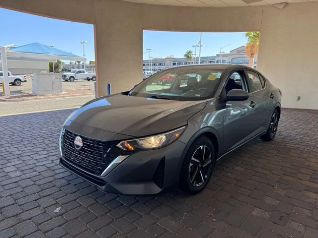 Used 2024 Gun Metallic Nissan SV image 1