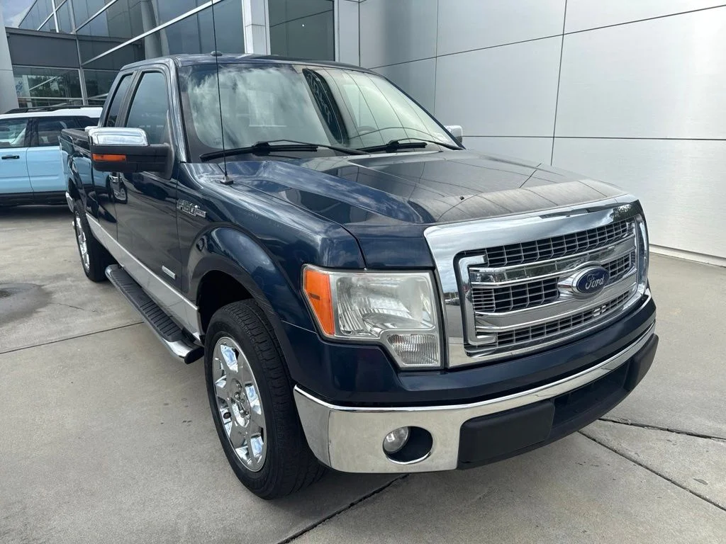 Used 2014 Blue Jeans Metallic Ford XLT image 1