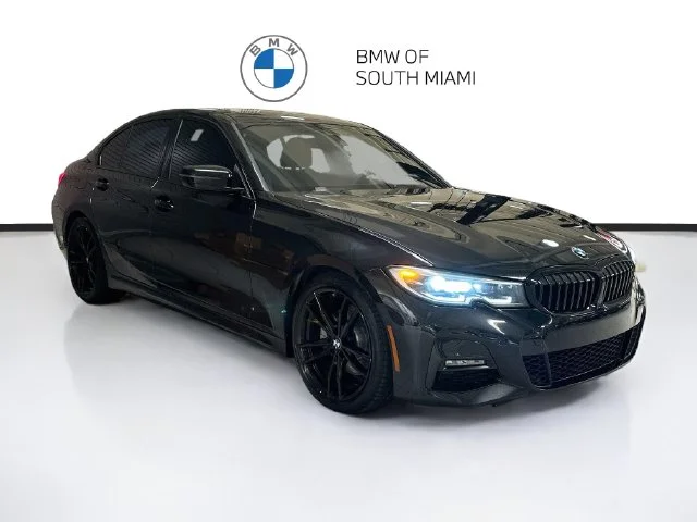 Used 2021 Black BMW 330i image 1