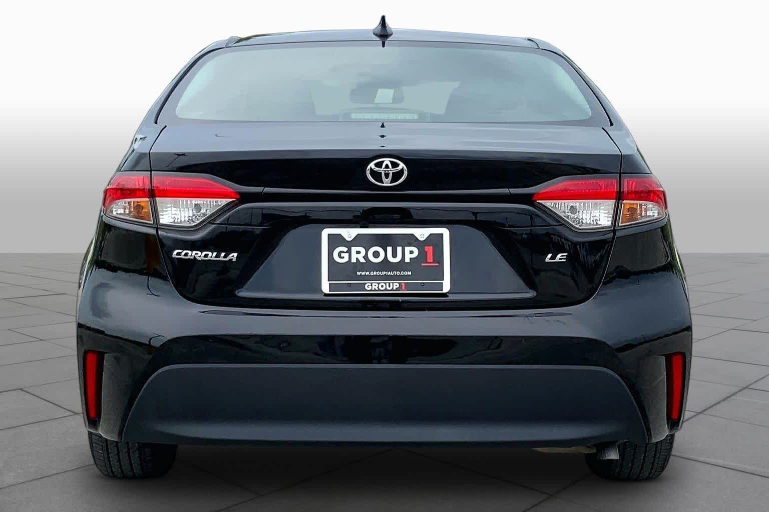 Used 2024 Midnight Black Metallic Toyota LE image 5