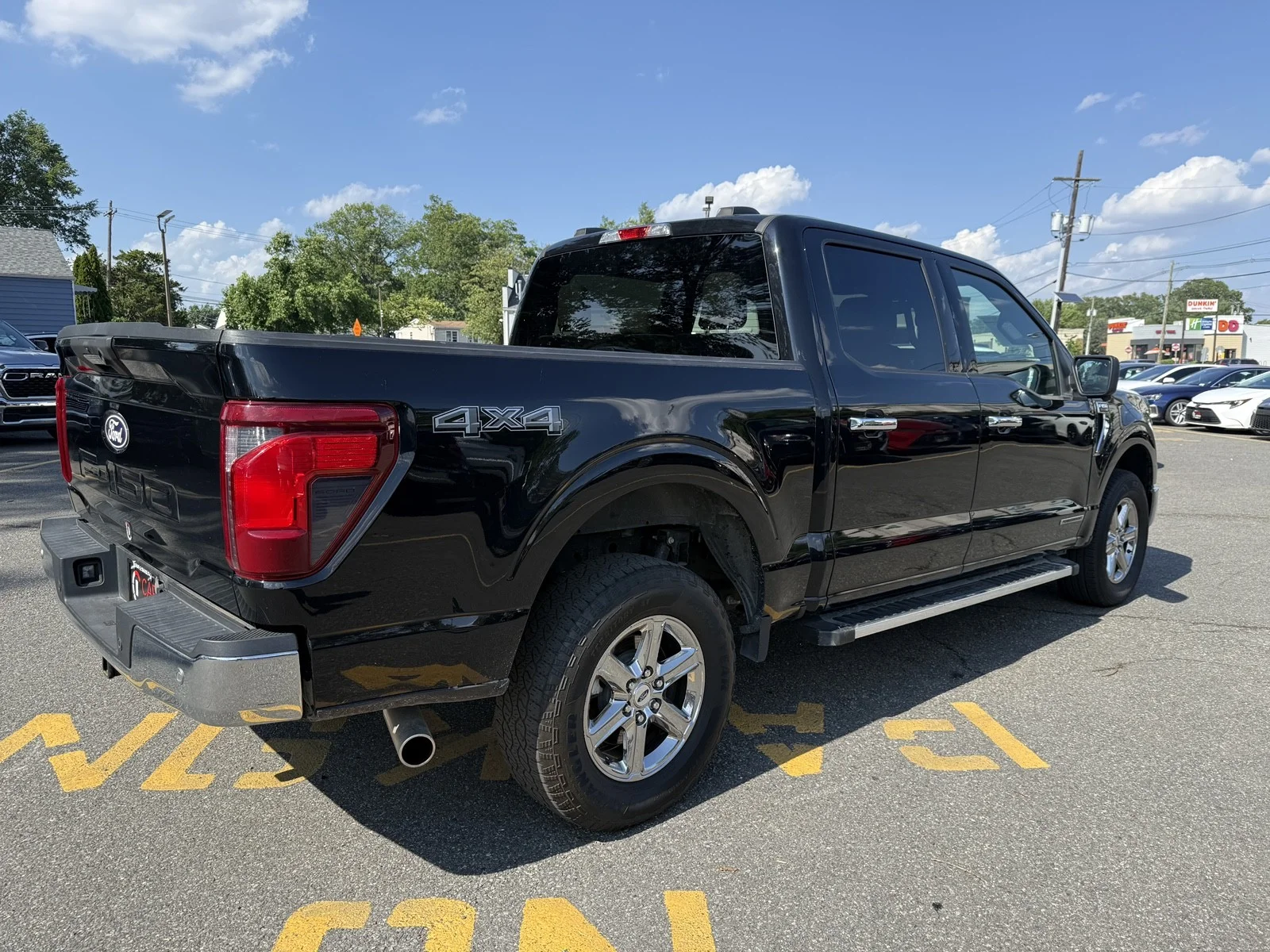 Used 2024 Agate Black Metallic Ford XLT 4WD image 5