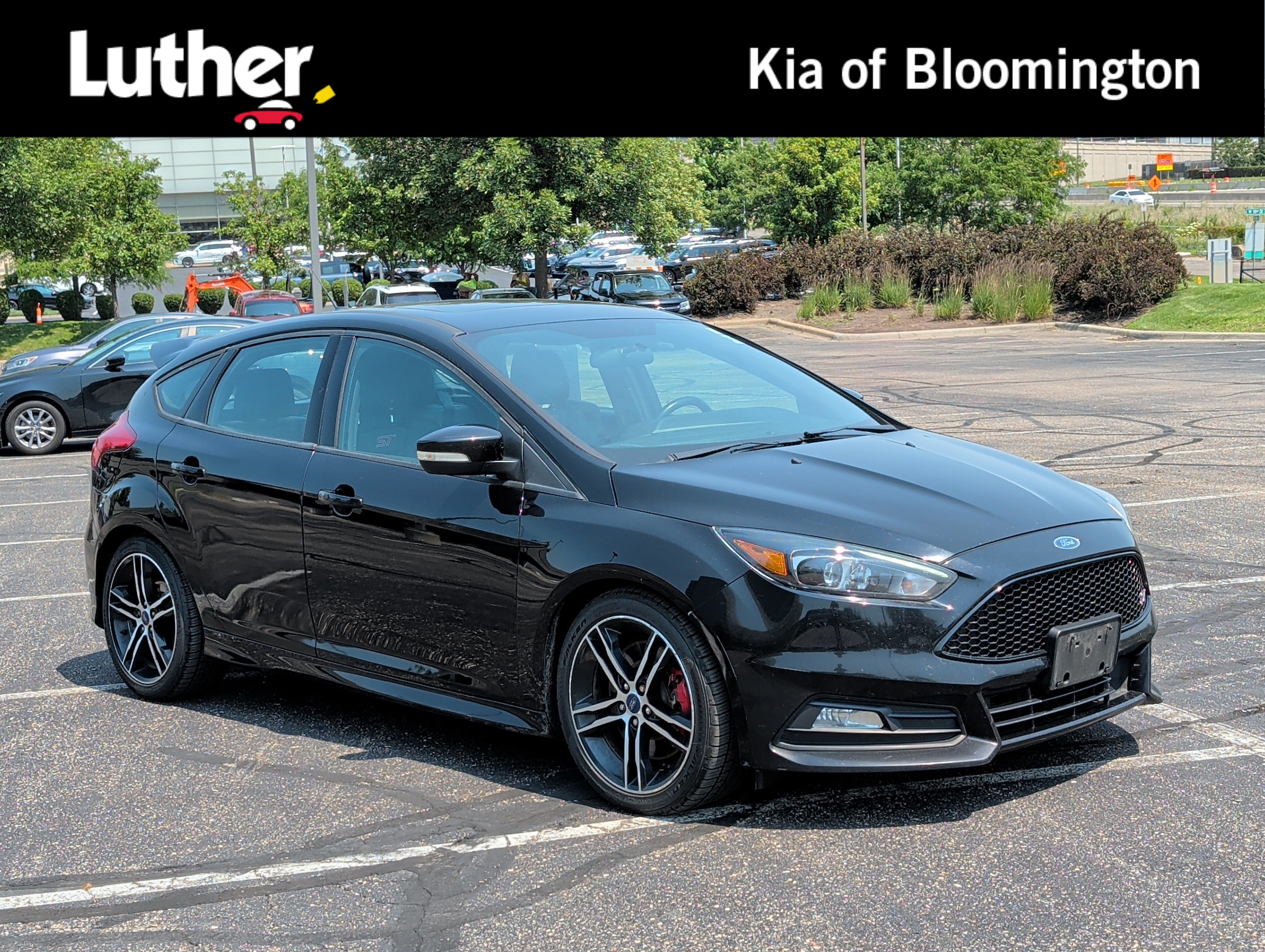 Used 2016 Shadow Black Ford ST image 1