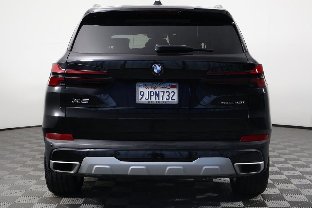 Certified Used 2024 Black Sapphire Metallic BMW sDrive40i image 5
