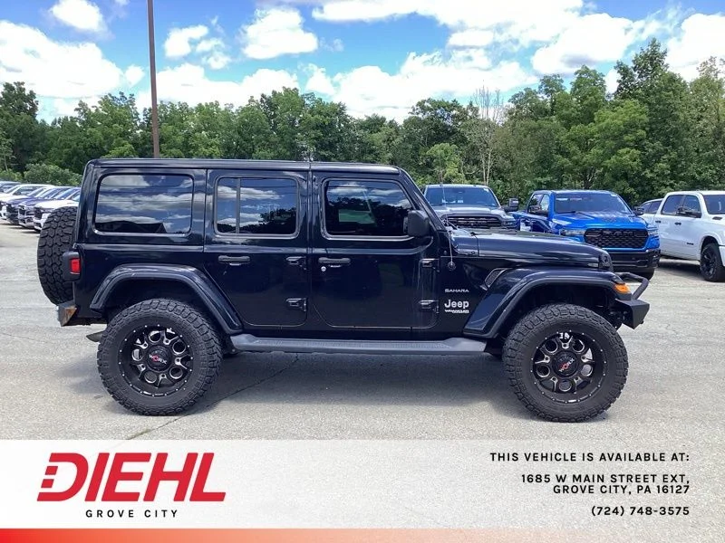 Used 2018 Black Jeep Unlimited Sahara image 5