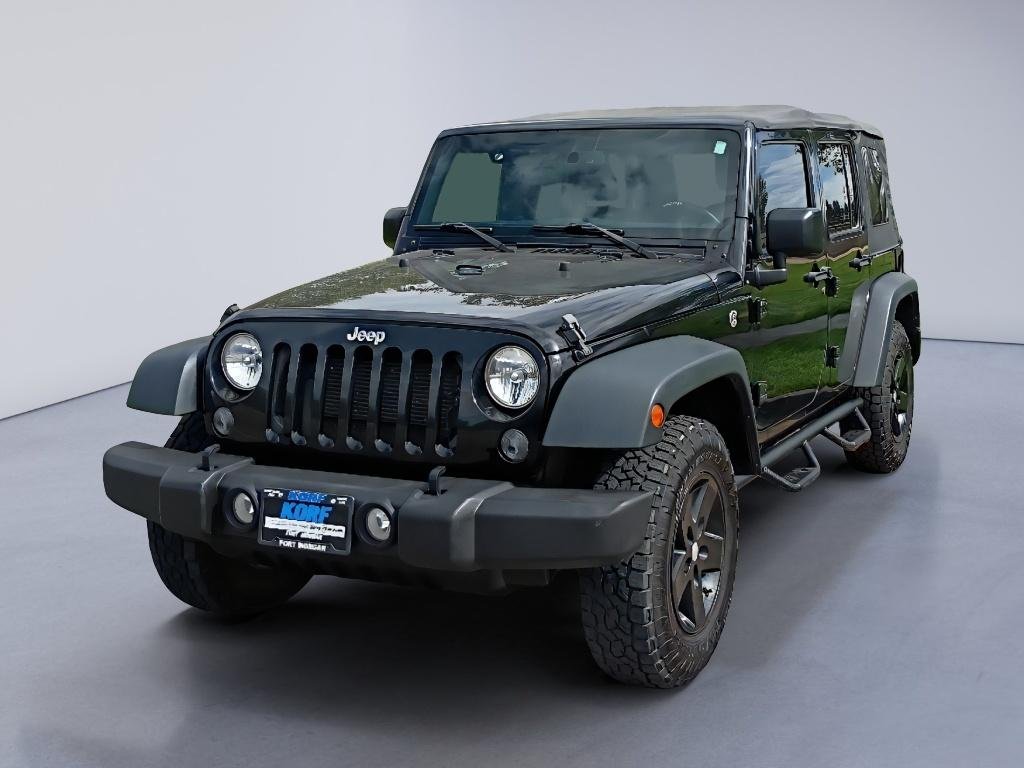 Used 2016 Black Clearcoat Jeep Sport image 1