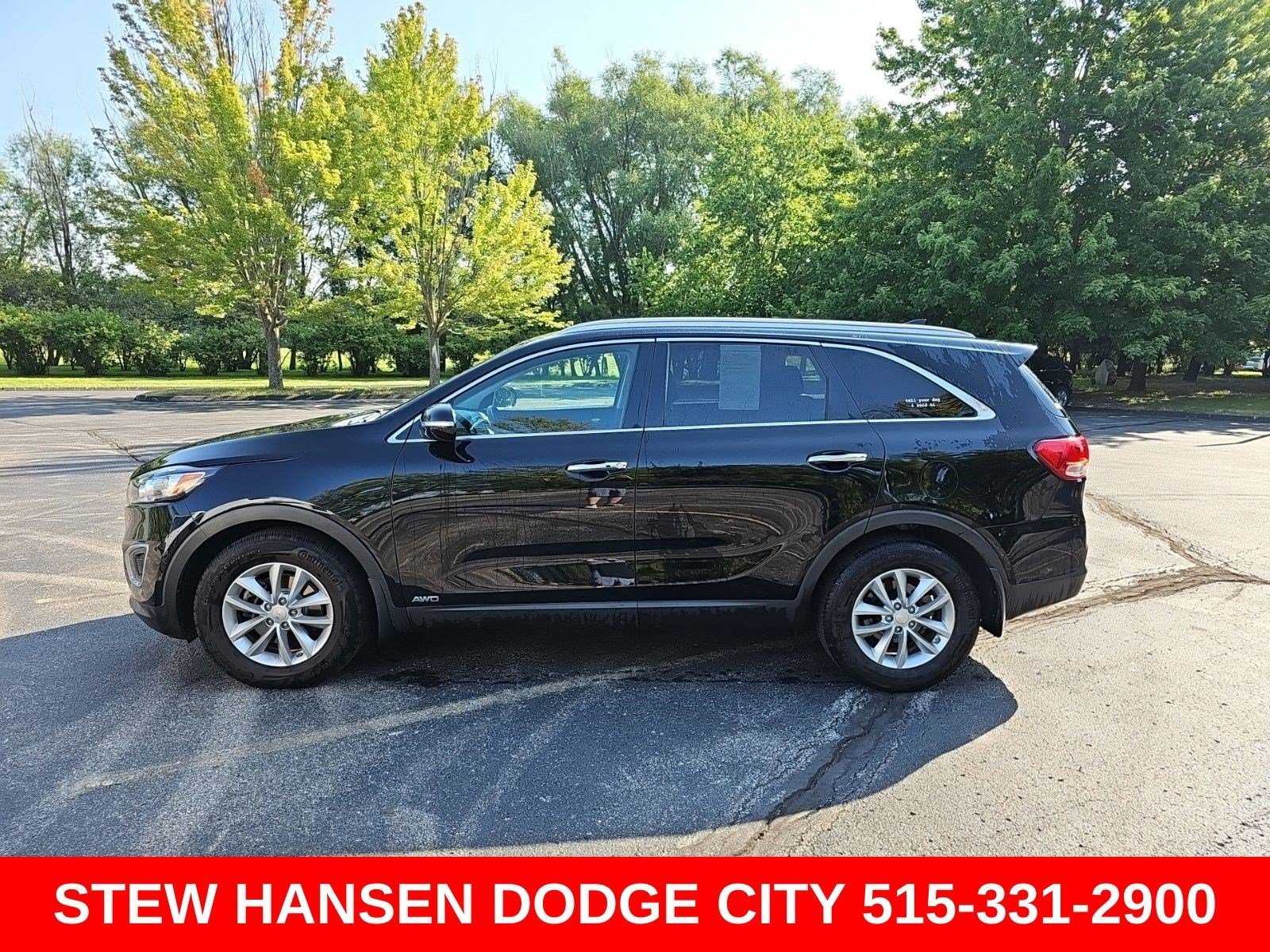Used 2017 Ebony Black Kia LX image 1