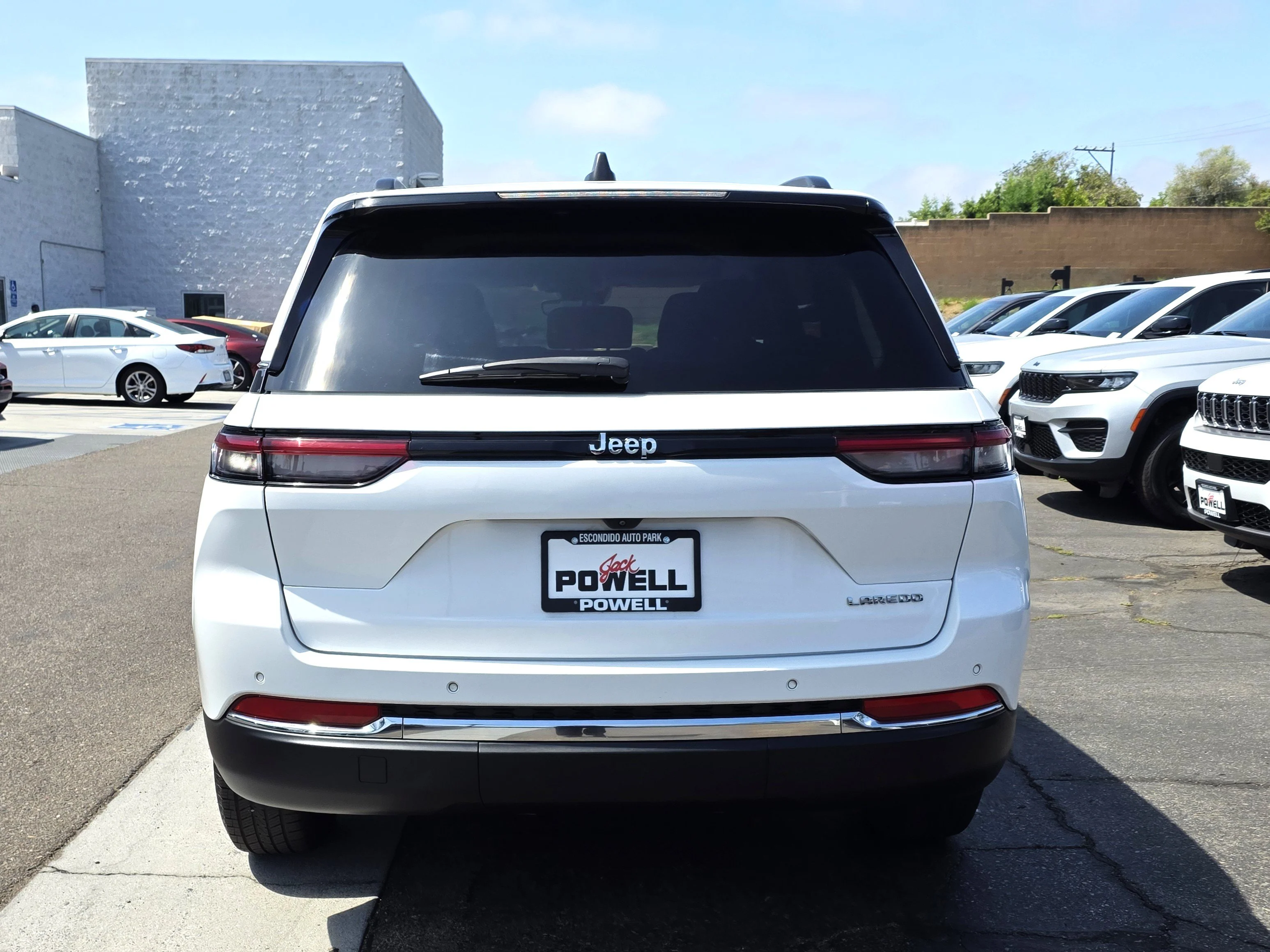 Certified Used 2024 Bright White Clearcoat Jeep Laredo image 4