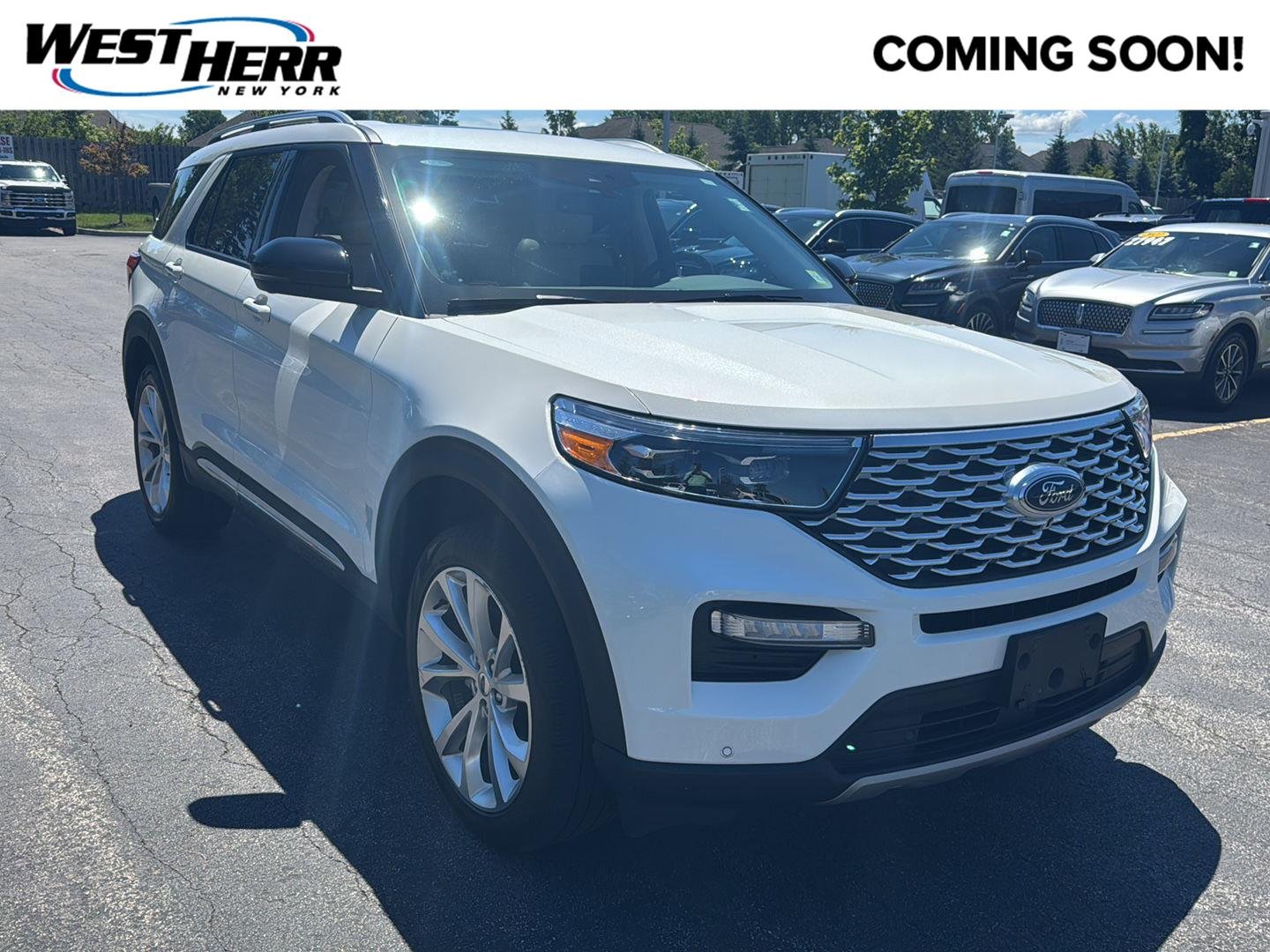 Used 2023 Star White Metallic Tri-Coat Ford Platinum image 1