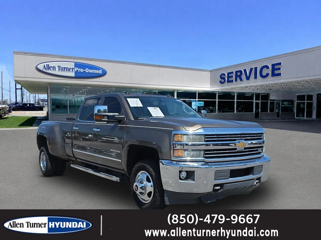 Used 2015 Brownstone Metallic Chevrolet LTZ image 1