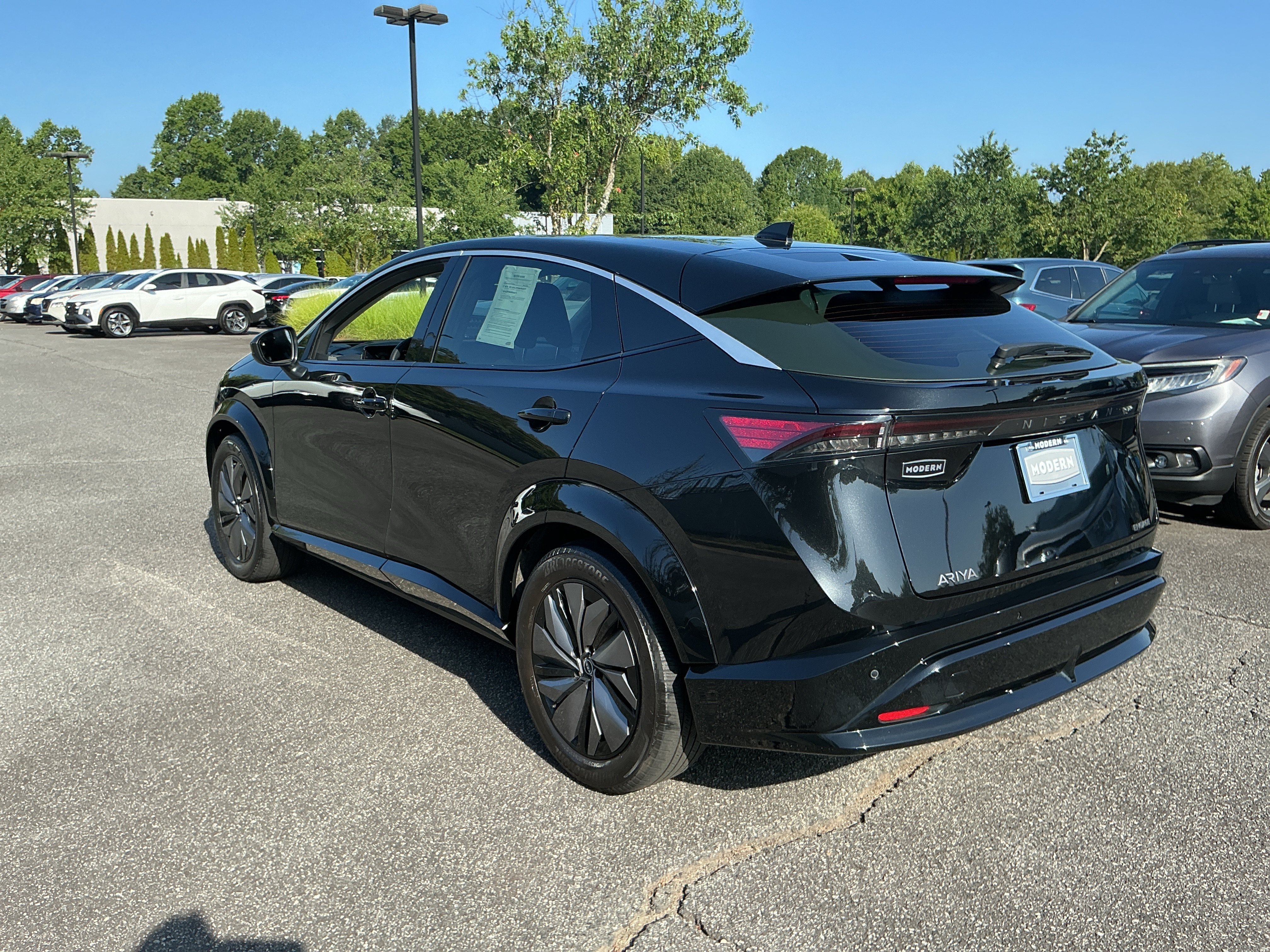 Used 2023 Black Diamond Pearl Nissan ENGAGE image 2