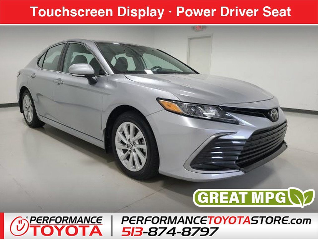 Used 2024 Celestial Silver Metallic Toyota LE image 1