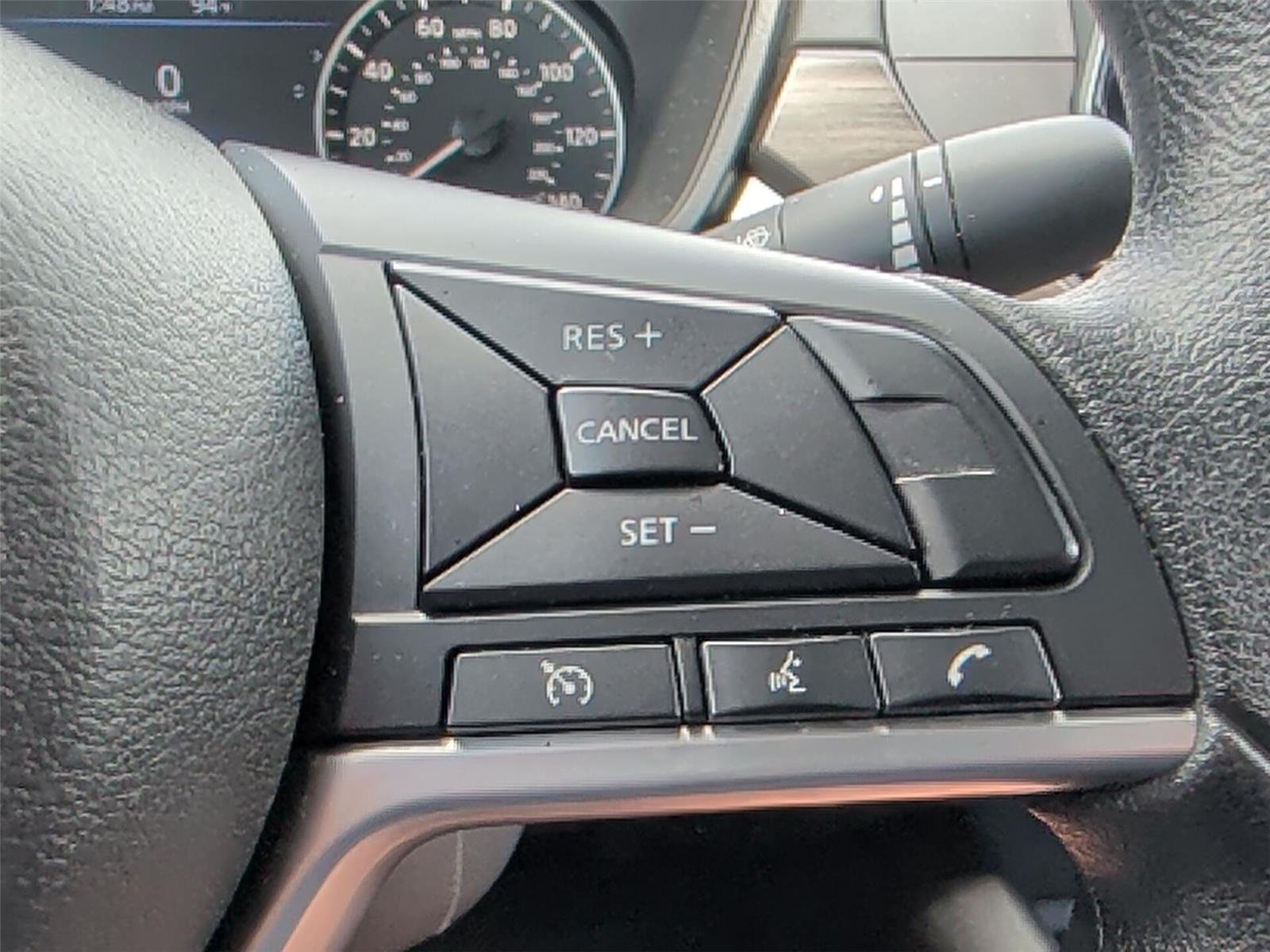 Used 2025 Garnet Pearl Metallic Nissan SV image 24