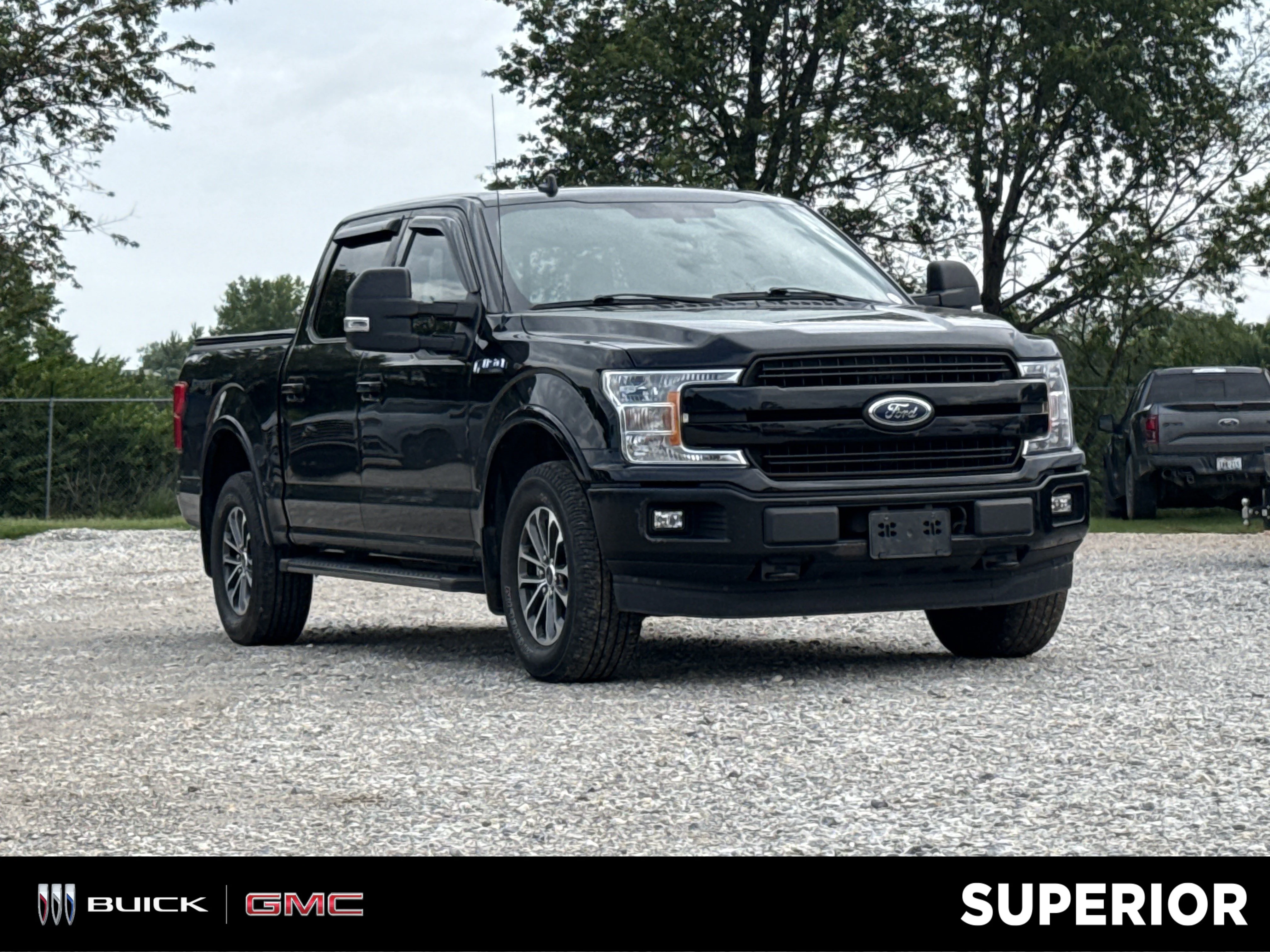 Used 2018 Shadow Black Ford Lariat 4WD image 1
