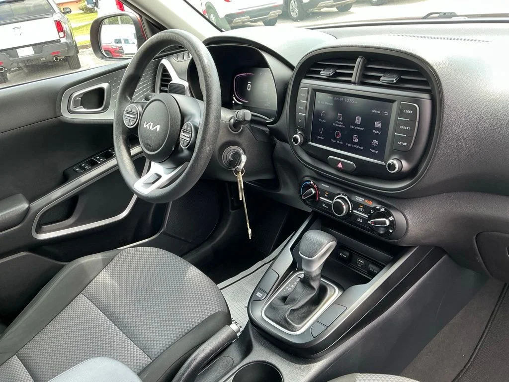 Used 2024 Orange Kia LX image 19