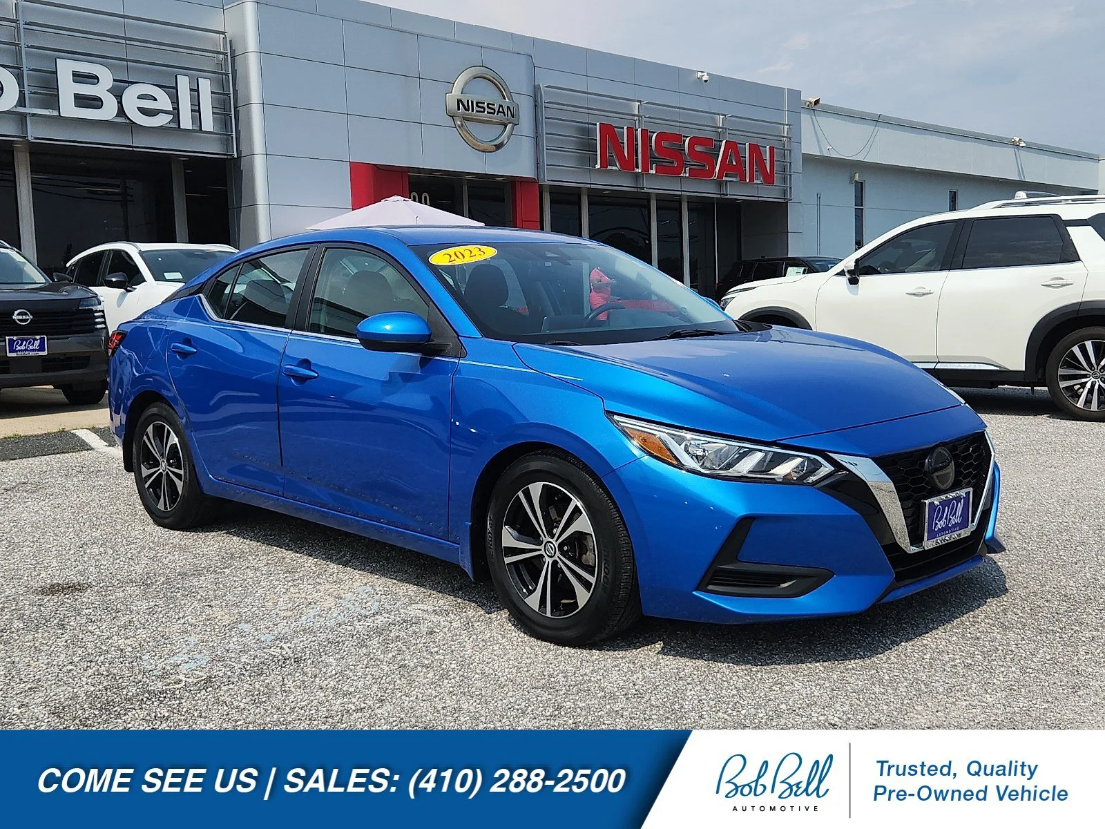 Used 2023 Electric Blue Metallic Nissan SV image 1