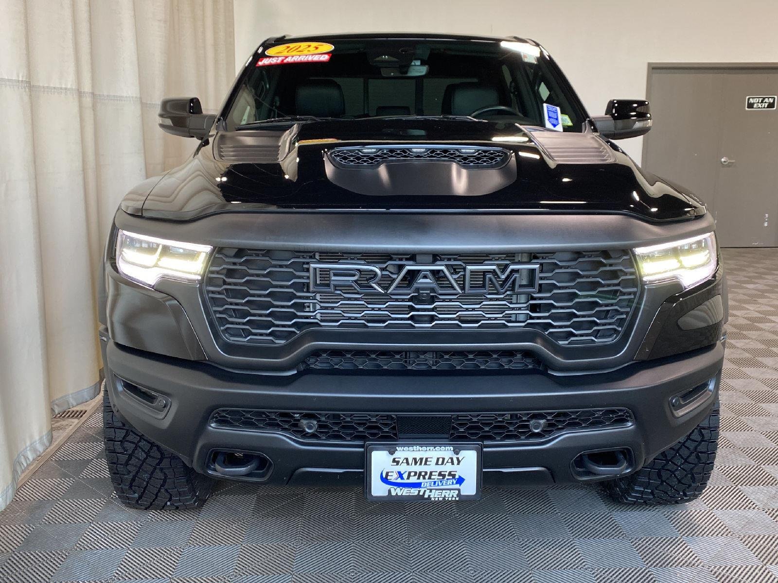 Used 2025 Diamond Black Crystal Pearlcoat Ram RHO image 4