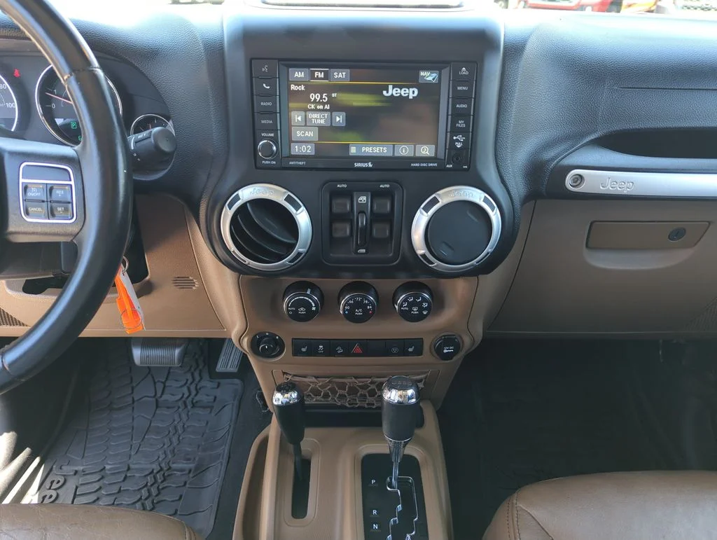 Used 2014 Black Jeep Unlimited Sahara image 24