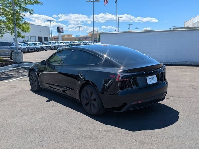 Used 2025 Solid Black Tesla Long Range image 5