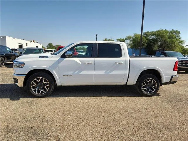 Used 2025 White RAM Laramie 4x4 Crew Cab 144.5 in. WB image 2