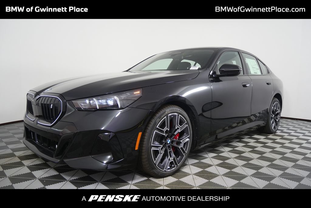 Certified Used 2026 Black Sapphire Metallic BMW xDrive40 image 1