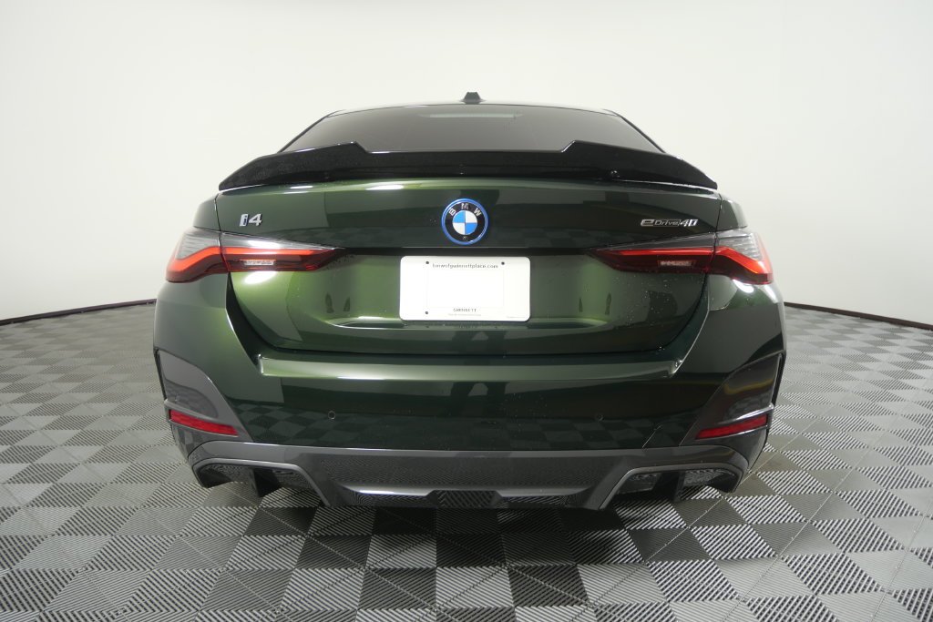Certified Used 2024 Green Metallic BMW eDrive40 image 6